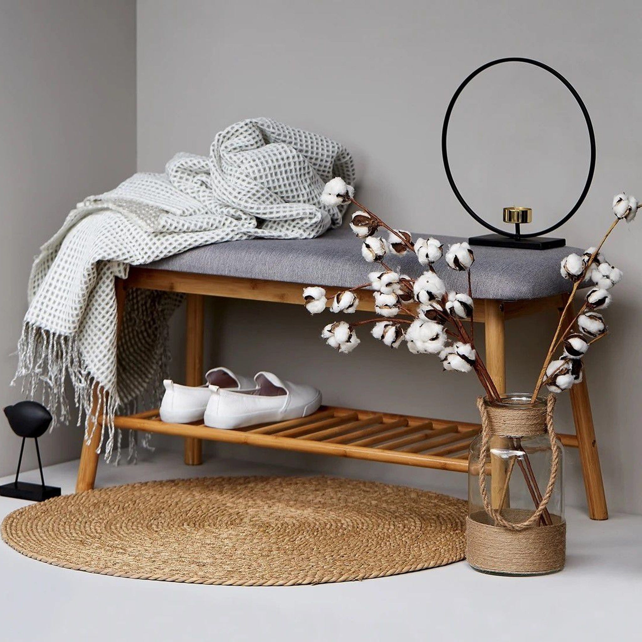High-quality shoe bench with a shelf for up to 4 pairs of shoes. Made of environmentally friendly, rapidly renewable hard and robust bamboo. Padded seat surface for added comfort while putting on or taking off shoes.