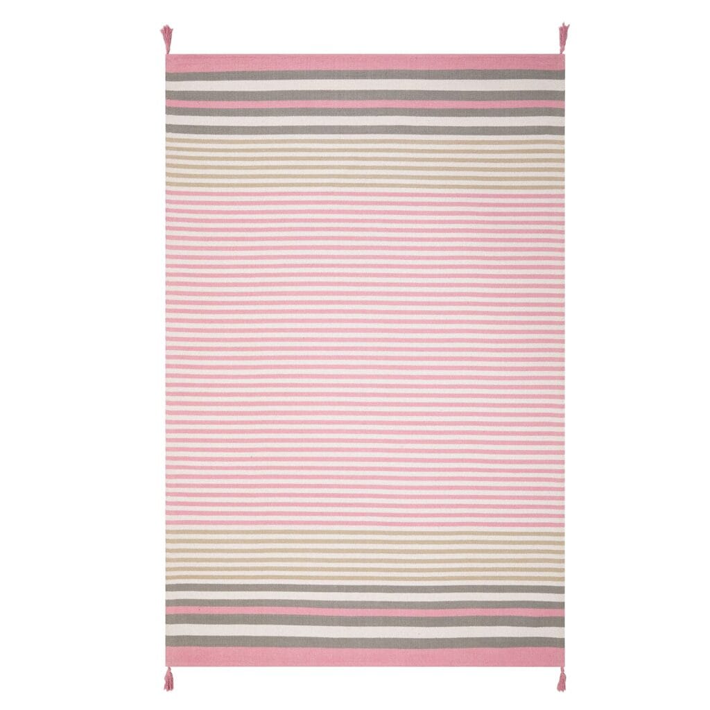 A balanced palette of striking pink and neutral hues, this rug was designed to brighten a range of spaces, including bedrooms, playrooms, and dining rooms.