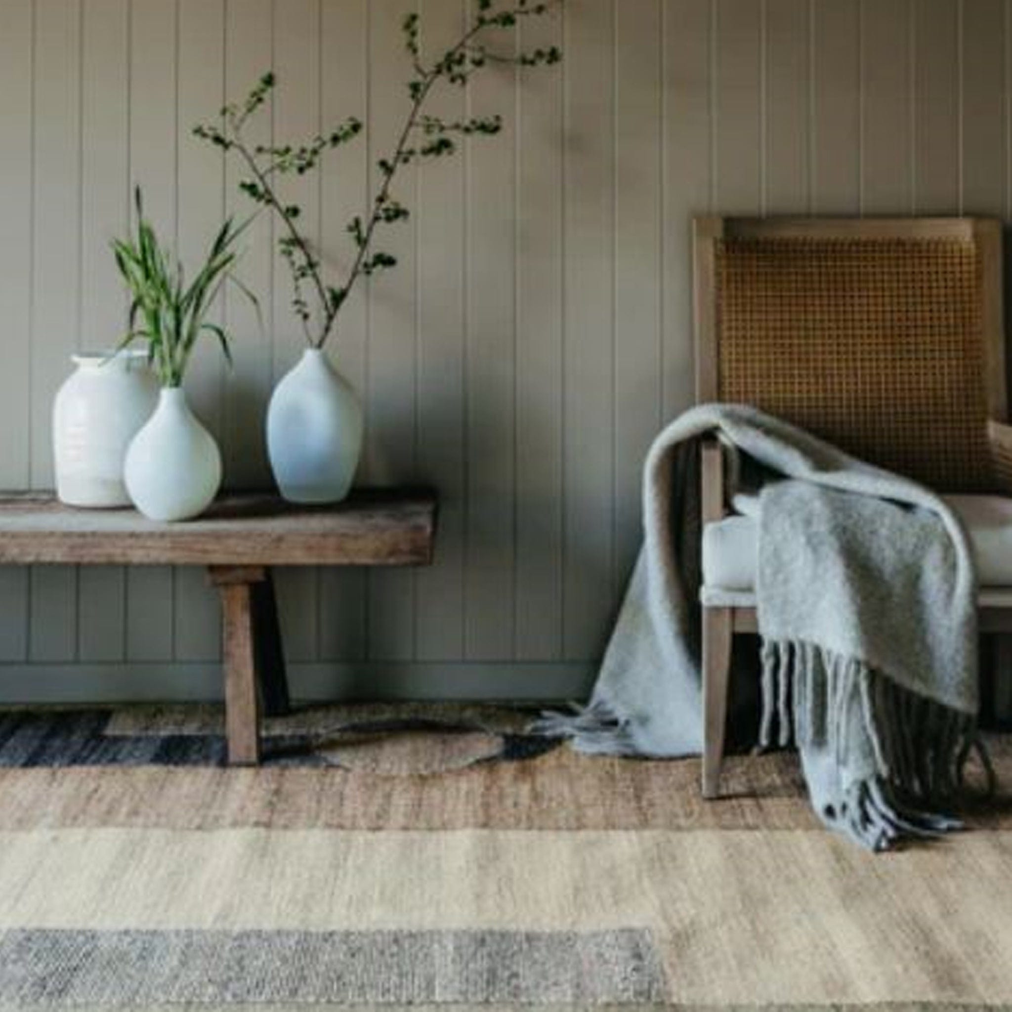 Add the finishing touch to your space with this handwoven rug. Inspired by the way the city of Tokyo effortlessly blends the modern with the traditional, this rug will bring a touch of refined playfulness to any space