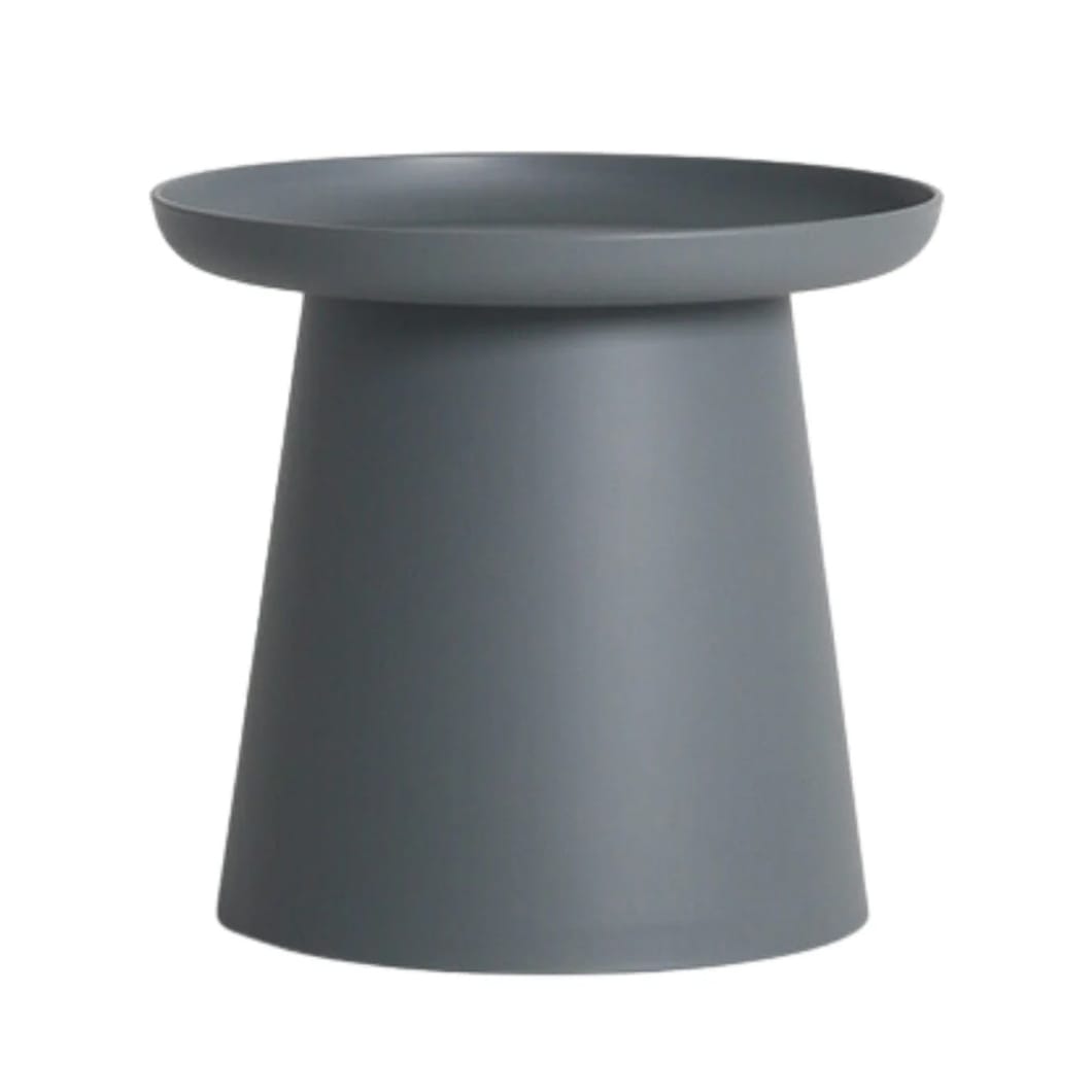 A modern design featuring a smooth round top and a subtly tapered base, perfect for holding your favorite book, a cup of coffee, or a decorative piece. Crafted from durable Polypropylene, the Clover Side Table is both stylish and practical, seamlessly blending form and function for your everyday needs.