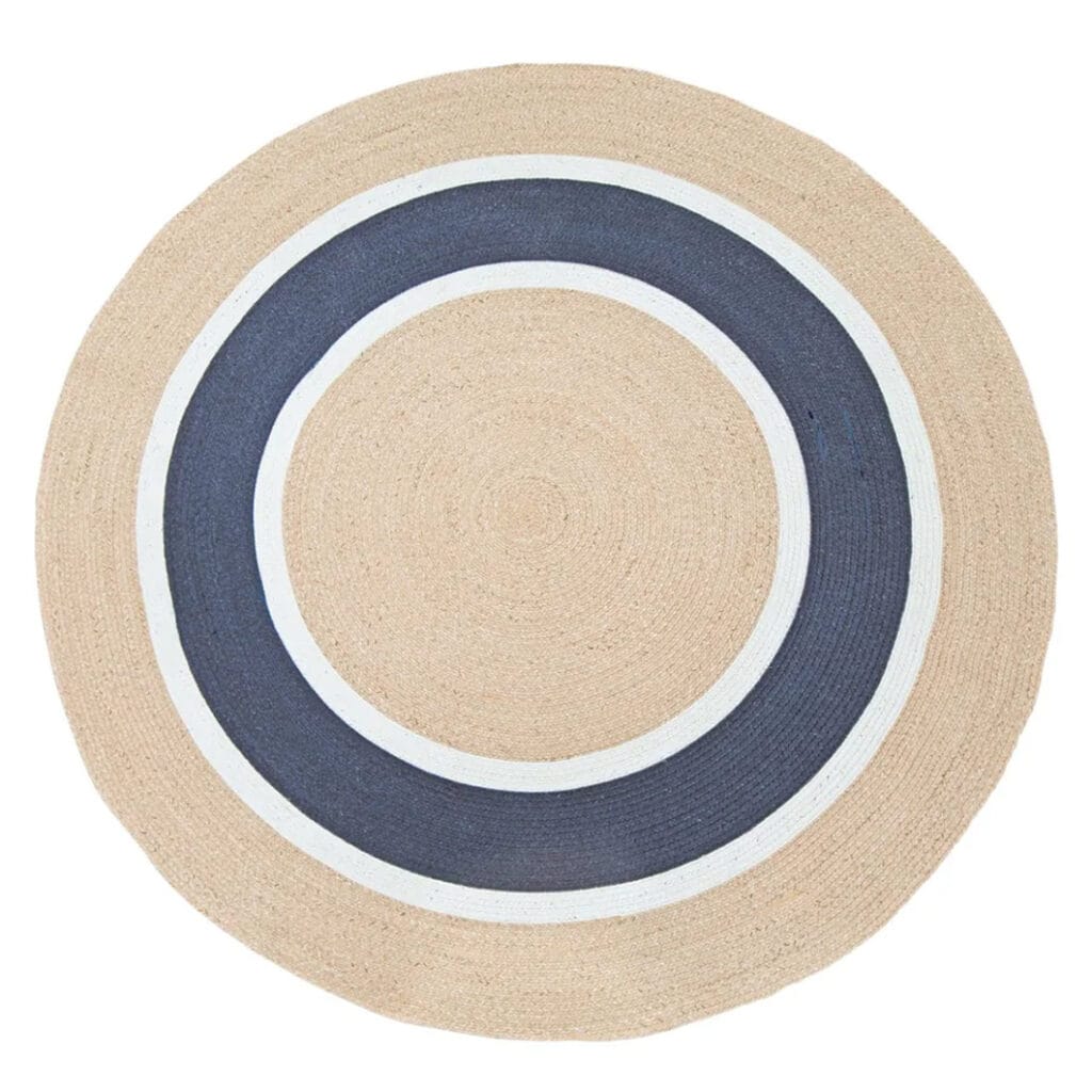 Lay the foundations for easy-breezy style with Hilo rugs. These fully outdoor rugs are made of 100% recycled PET polyester and provide hassle-free maintenance – simple hose them down with water and leave out in the sun. A natural tone forms the basis of these simple-to-style round rugs and a muted note of colour to complement your surroundings.