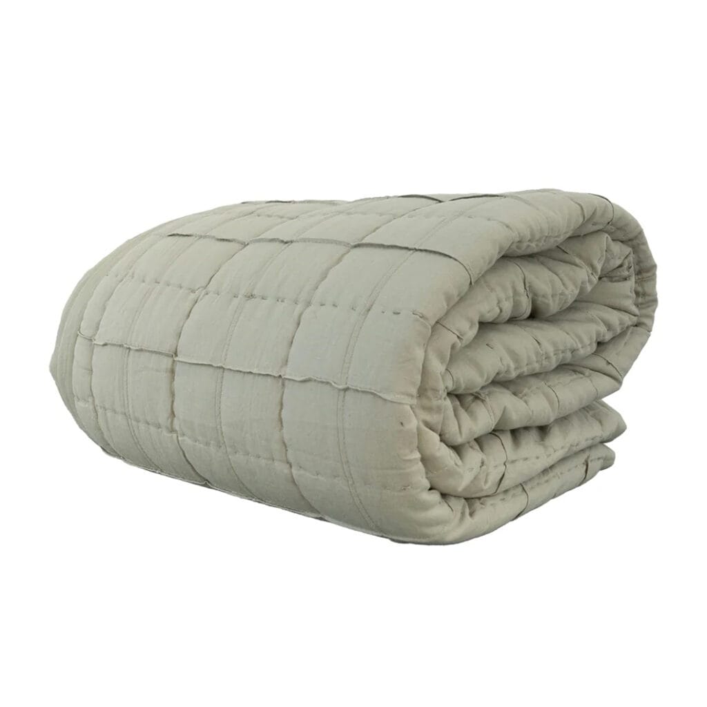 The hand-finished Anthology quilt features a classic pattern that evokes the nostalgia of hand-sewn quilts, while two subdued colourways give it a contemporary twist. With its delightful blend of soft cotton and durable linen, this quilt will be your perfect companion for cool evenings and lazy mornings. Cotton & linen blend with a microfiber filling and 100% cotton backing. Made in India