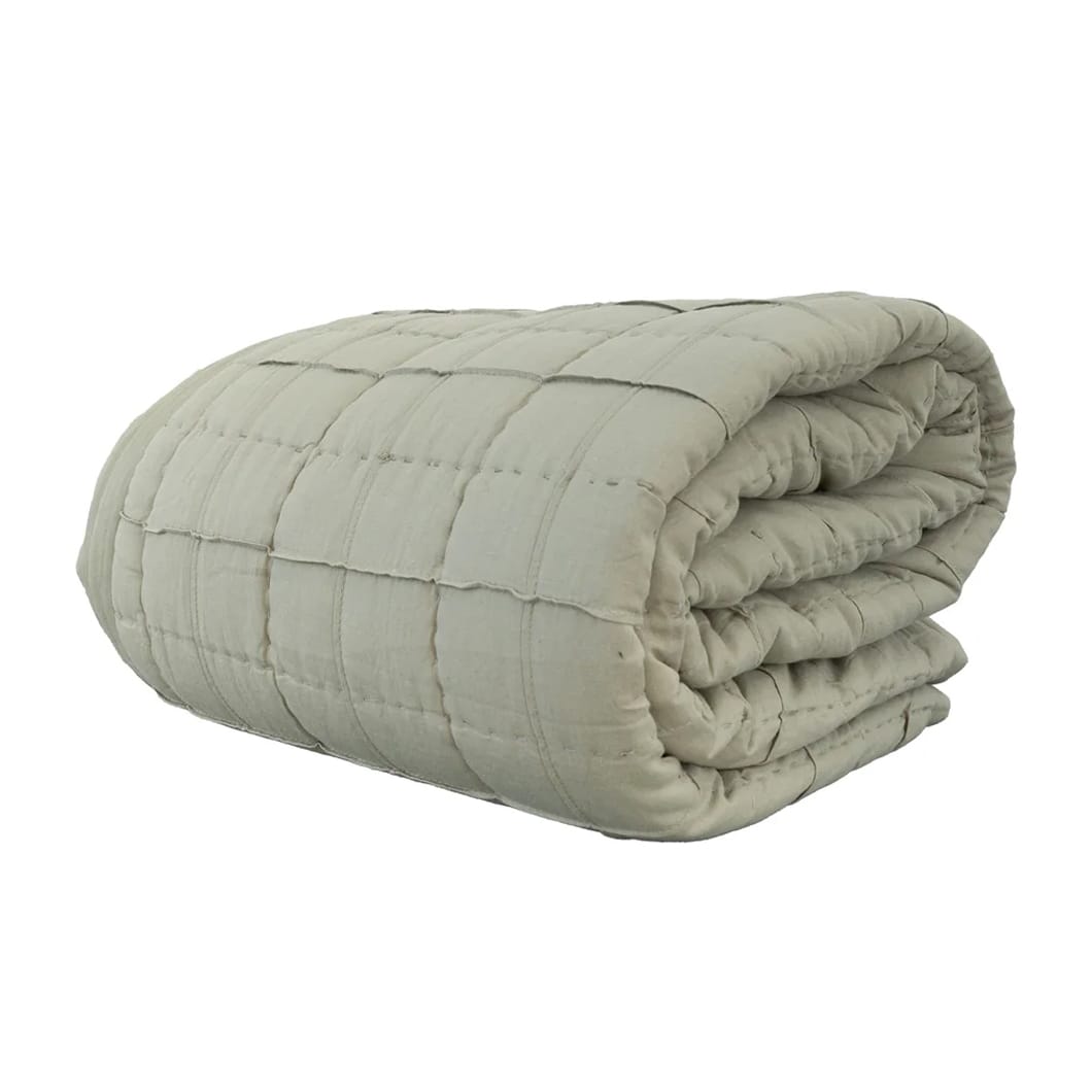 The hand-finished Anthology quilt features a classic pattern that evokes the nostalgia of hand-sewn quilts, while two subdued colourways give it a contemporary twist. With its delightful blend of soft cotton and durable linen, this quilt will be your perfect companion for cool evenings and lazy mornings. Cotton & linen blend with a microfiber filling and 100% cotton backing. Made in India