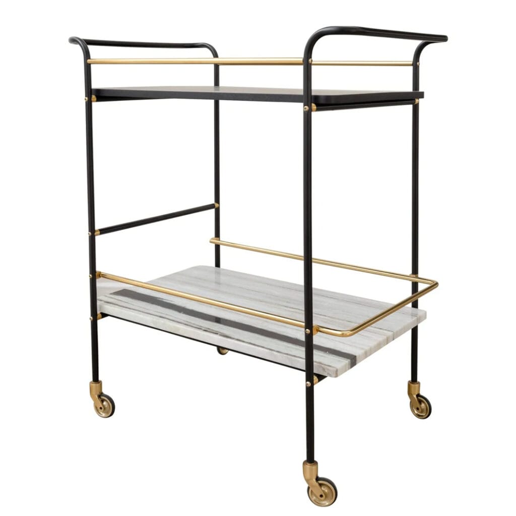 Cheers to our Sable drink trolley, the ultimate party companion that is sure to elevate your hosting game. Composed of marble, mango wood and steel, this versatile piece is perfect for showcasing your favourite drinks and glassware. A must-have for any home bar or entertainment area. Minor assembly required.