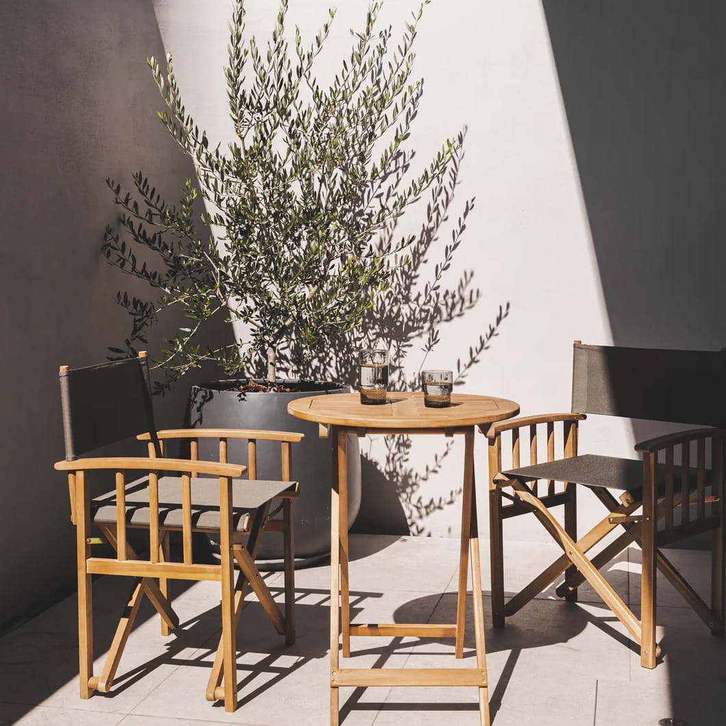 Crafted from durable, weather-resistant acacia wood and 100% olefin sling fabric, the fully outdoor Safari chair is made for long, lazy days in the open air. Its natural wood grain finish gives it rustic charm, while its foldable design makes it easy to set up and store. Available in two colour ways. Minor assembly required.