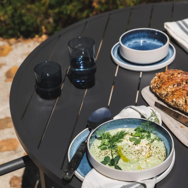 Embrace warm weather and outdoor entertaining with the handmade Serengeti outdoor table collection, elegantly crafted from 100% aluminium and featuring both round and rectangular tabletops. The tables come in easy-to-style colours and various sizes: rectangular tables with open slats that seat four, six to eight, or eight to 10 people, as well as round four-seater and six-seater tables. Suitable for indoor and outdoor use. 