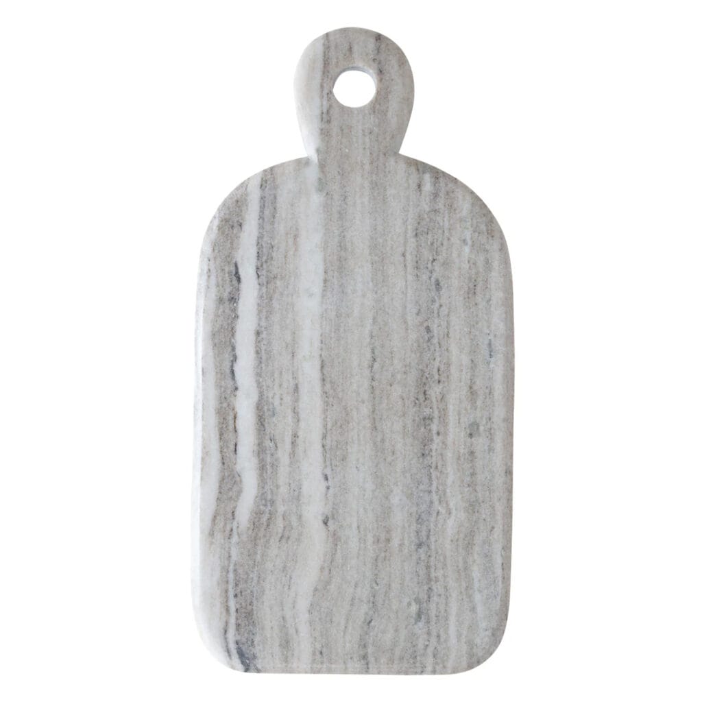 The Stonehaven cutting board will be a practical yet pleasing addition to your kitchen. Composed of sandstone, the weight of this handmade board gives it stability on countertops, preventing slipping during use. The Stonehaven is ideal not only for chopping tasks, but for food presentation too