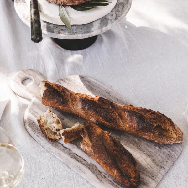 The Stonehaven cutting board will be a practical yet pleasing addition to your kitchen. Composed of sandstone, the weight of this handmade board gives it stability on countertops, preventing slipping during use. The Stonehaven is ideal not only for chopping tasks, but for food presentation too
