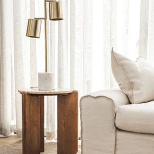 Our boldly proportioned Cascade range of side tables and coffee tables blends the warmth of wood with the cool sophistication of stone. Crafted by hand, these head-turners feature legs made of solid mango wood and a travertine tabletop, which mimics the classic appeal of marble with its polished finish. Minor assembly required