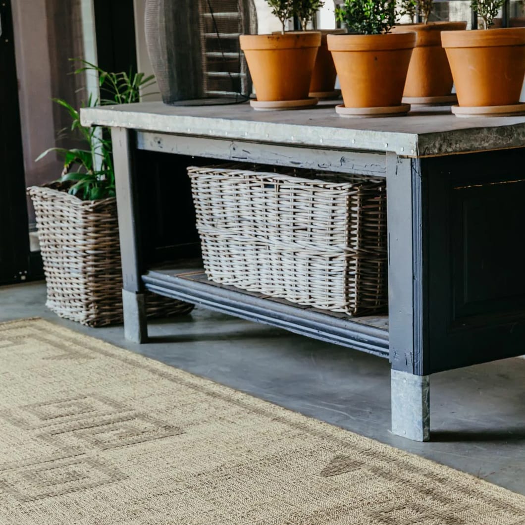 With a design inspired by the tapestry of organically formed patterns found in Africa, this handwoven rug will make a bold statement while adding a touch of character to your indoor spaces. The blend of materials makes this piece a compelling combination of softness and robustness.