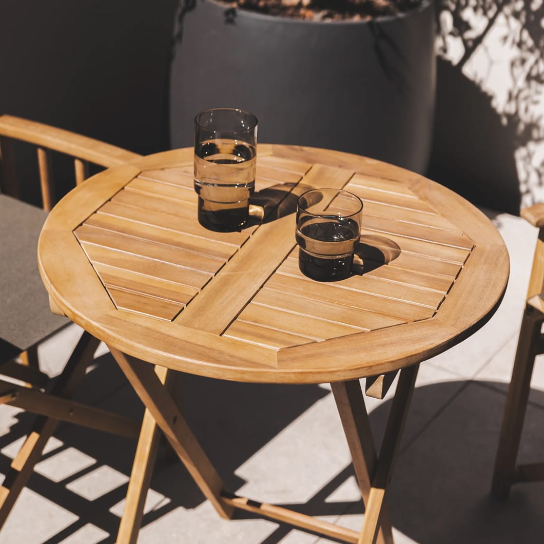 Designed for easy set up and storage, the foldable, fully outdoor Safari table is the most savvy and stylish open-air accent under the sun. Made of acacia wood and reinforced with steel, it comes as a two-seater and a four-seater, making it ideal for intimate or more social gatherings outside. Minor Assembly Required