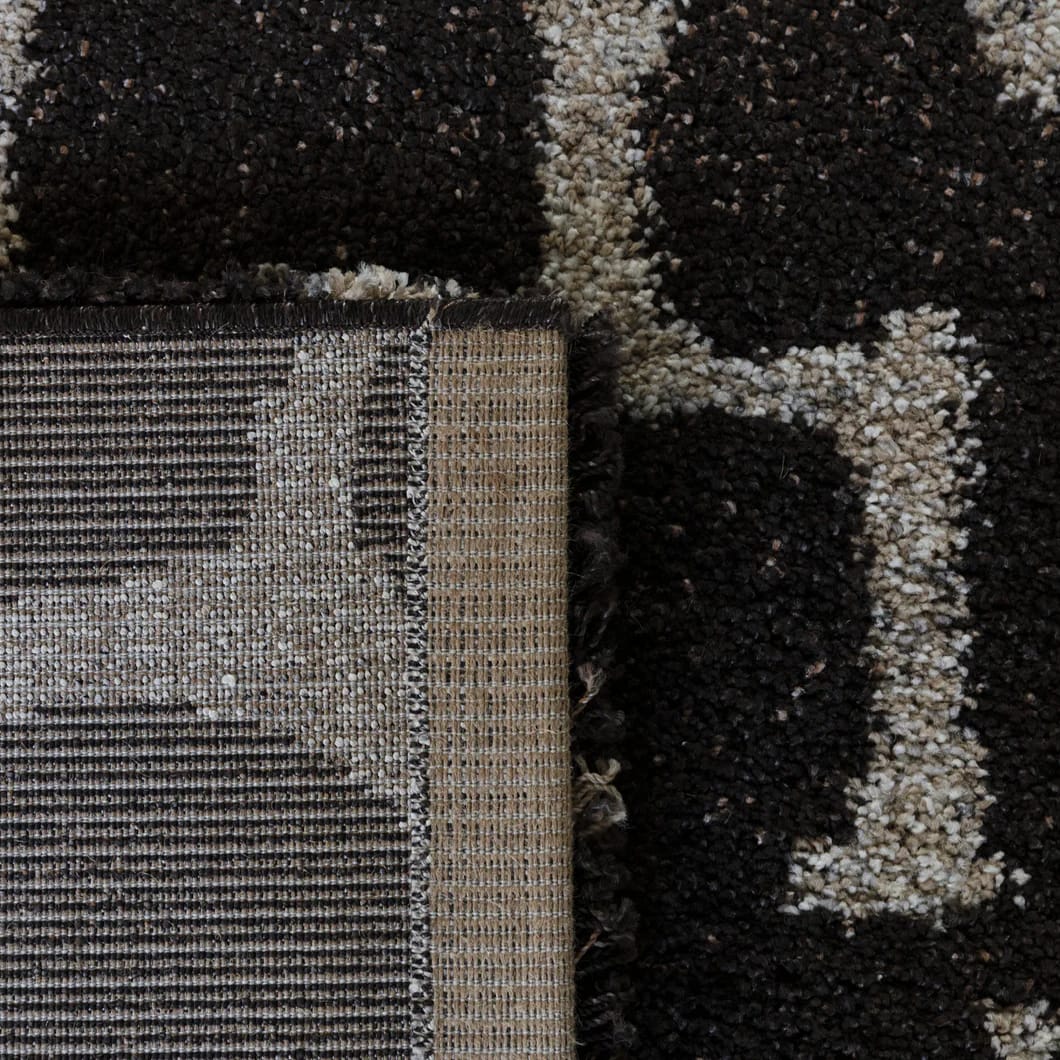 Durable 100% polypropylene shaggy rug made in Belgium, crafted with precision and quality. Their supple yet strong fibres resist wear and tear, making them perfect for high-traffic areas, while their contemporary patterns will instantly refresh living spaces. A practical and stylish choice for modern homes. Available in two sizes.