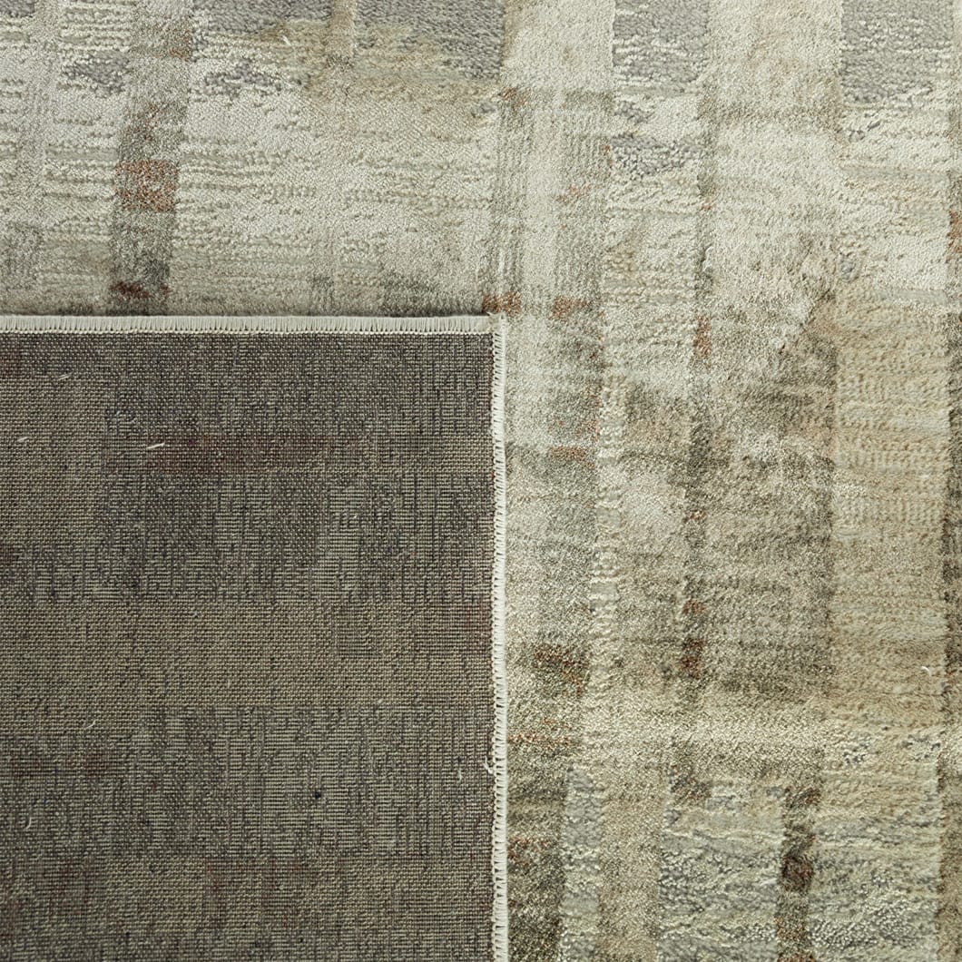 Ether rugs bring the luxurious softness of viscose and the durability of polyester to the floor. This beautiful blend coupled with their smooth, soft feel underfoot make these rugs as comfortable and they are stylish. Available in two versatile colourways and three sizes. Viscose cut-pile rug with polyester shrink yarn. Made in Belgium.